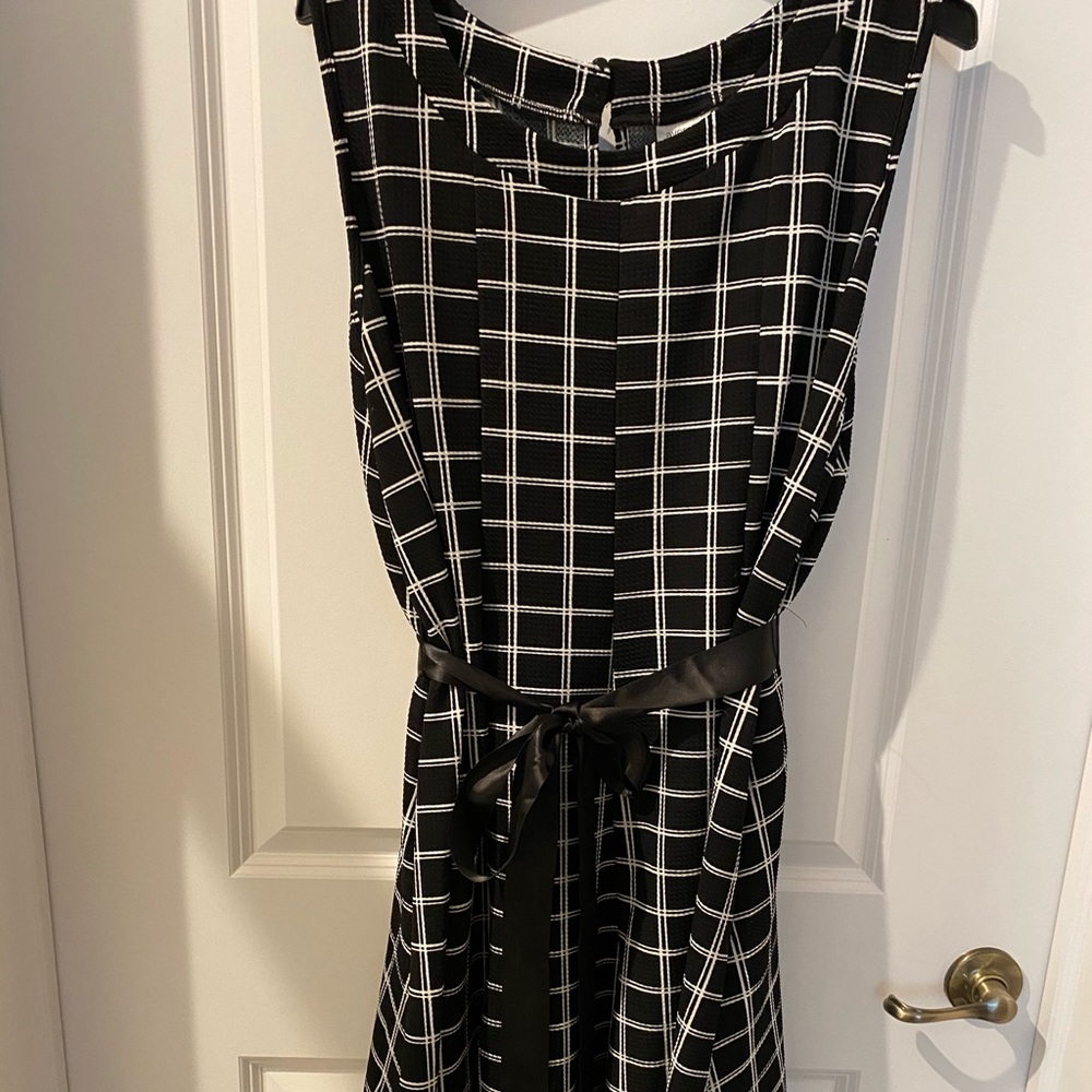 Skater dress with ribbon belt tie.